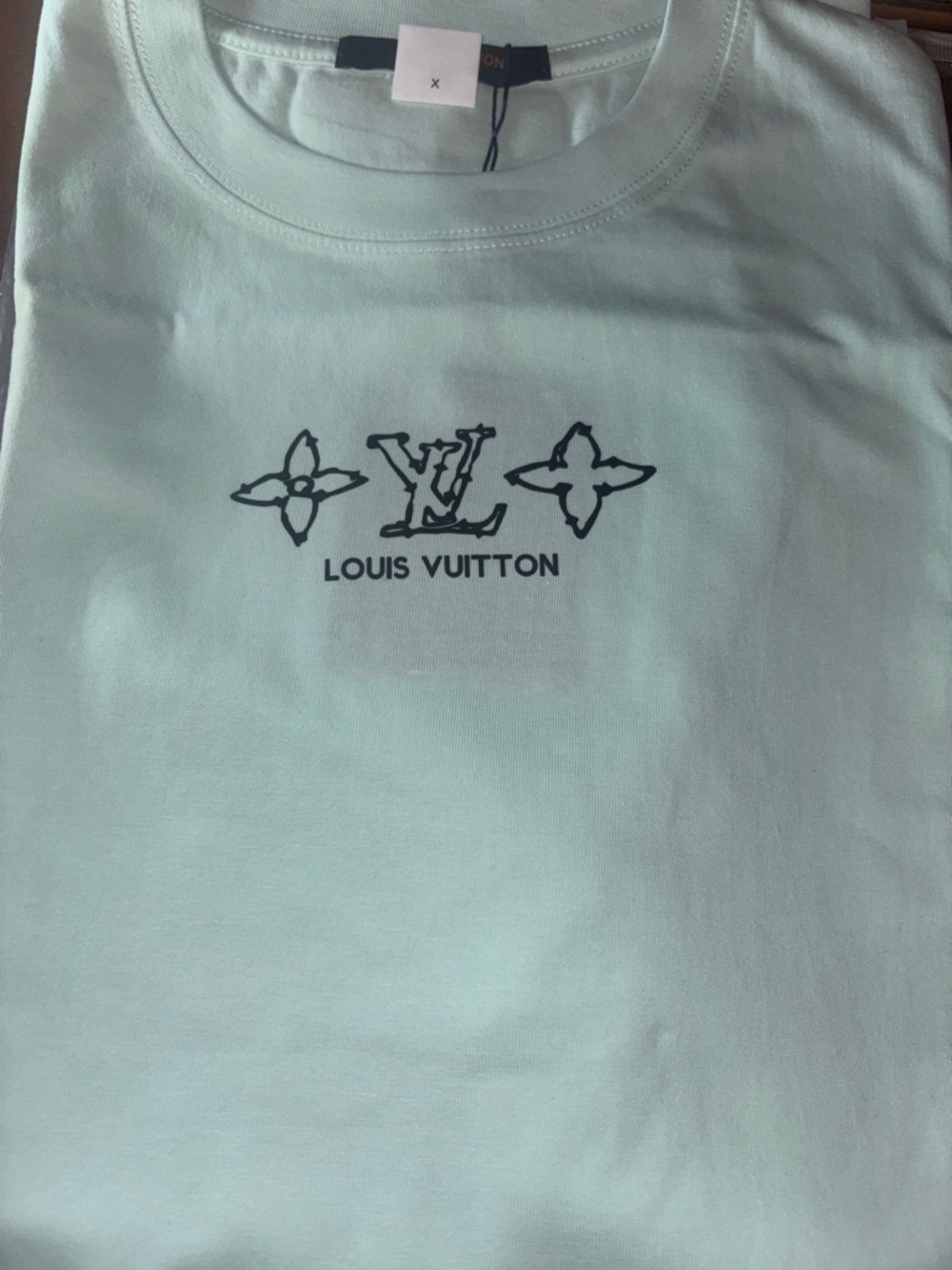 Louis Vuitton Mint Green Tee with Black Logo read 👇